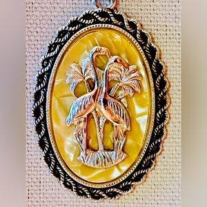 EUC VINTAGE GERMAN MADE CAMEO WITH A RARE CELLOPHANE BACKGROUND AND FLAMINGOS